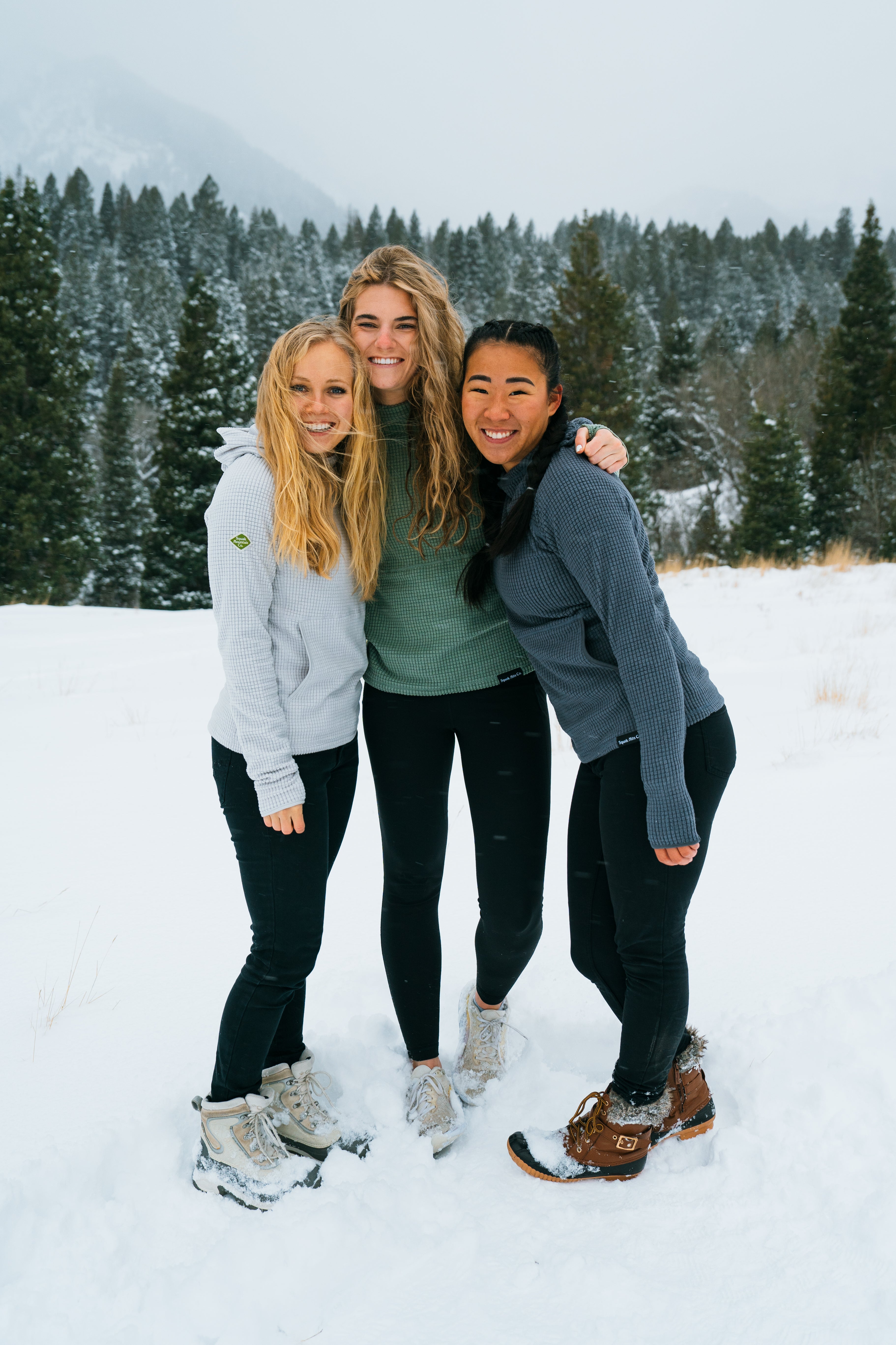 Three friends wearing micro grid fleece hoodie for outdoors from Squak Mountain Co.