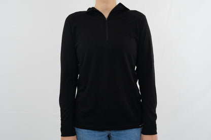 Person wearing womens black wool base layer hoodie from Squak Mountain Co.
