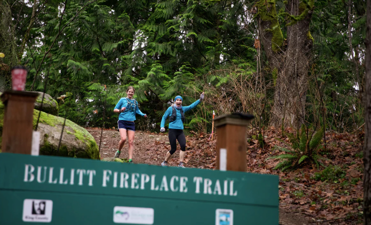 two women trail running on Squak Mountain