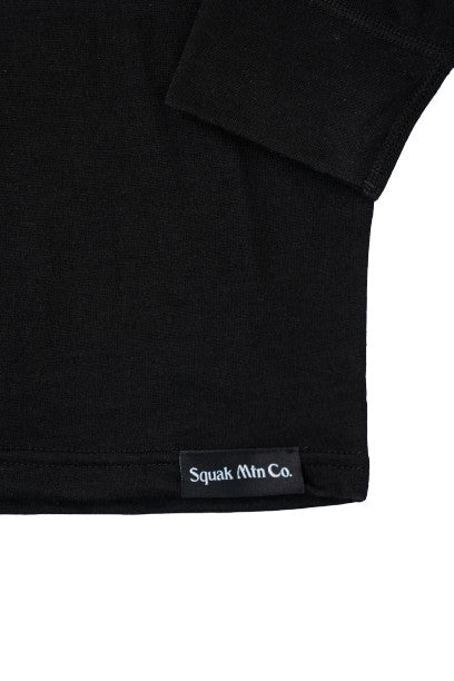 Logo on black wool base layer hoodie from Squak Mountain Co.
